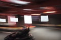 Blurred Go kart driver speed rive indoor circuit race Royalty Free Stock Photo