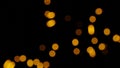 Blurred gold bokeh shining light design.