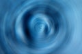 Blurred gradient radial motion classic blue background. Mixed circular texture