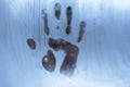 blurred handprint on the fogged glass Royalty Free Stock Photo