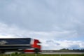 Blurred heavy truck on highway