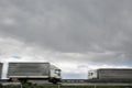 Blurred heavy trucks on highway