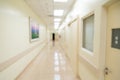 Blurred hospital indoor corridor hallway as background for graphic pursuit