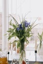 Blurred image of bouquet of fresh tulips in flower shop. Spring floral tulip bunch Royalty Free Stock Photo