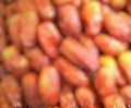 The blurred image bunch of ripen dates in the market