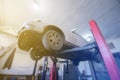 blurred image of a car at a technical service station, the background is blurred Royalty Free Stock Photo