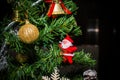 Blurred image of Christmas Decorations In Christmas Tree with copy space of blur light boken and people background. vintage tone Royalty Free Stock Photo