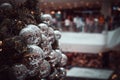 Blurred image of Christmas Decorations In Christmas Tree with copy space of blur light boken and people background. vintage tone Royalty Free Stock Photo
