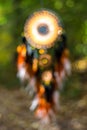 Blurred image, dream catcher native american in the wind with sunlight and blurred bokeh Royalty Free Stock Photo