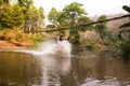 Blurred image enduro motorcycle racer drove into the water