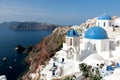 Blurred image of the famous 3 Blue Domes at Santorini