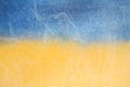 Blurred image Flag of Ukraine, Hoarfrost on glass, frost, cold. Yellow-blue background. Symbol, poster, banner of the national fl