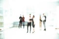 Blurred image of a group of business people talking in the office lobby. photo with copy space Royalty Free Stock Photo