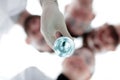 Blurred image of a group of scientists.