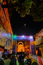 Blurred image, Kolkata, West Bengal, India. Decorated Durga Puja pandal at night, beside street of Kolkata. Biggest festival of