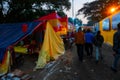 Blurred image, Kolkata, West Bengal, India. Devotees walking at Gangasagar transit camp to visit Hindu sadhus at their camps ,