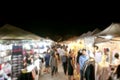 Blurred image a lot of people Shopping at Walking Night Market Thailand on Weekends, Many Person at Night street fashion market Royalty Free Stock Photo