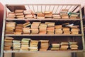 blurred Image many old books on bookshelf in library. Royalty Free Stock Photo