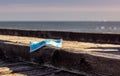 blurred image on a mask by the sea, summer begins how will the covid 19 behave? Royalty Free Stock Photo