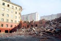 Blurred image Pile of demolition rubble. Gray rubble at a building site. Demolition of a house. Concrete rubble debris