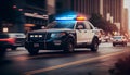 Blurred image of a police car that is moving fast on a city street Royalty Free Stock Photo