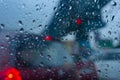 Blurred image, raindrops falling on wet glass, abstract blurs of traffic - monsoon stock image of Kolkata formerly Calcutta Royalty Free Stock Photo