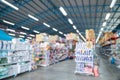 Blurred image Rows of shelves with goods boxes in modern industry warehouse store at  large store or factory warehouse storage. Royalty Free Stock Photo