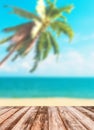 Blurred image of sea sky coconut tree with wooden under