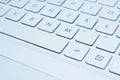 Blurred image of white laptop kayboard,  close up. Royalty Free Stock Photo