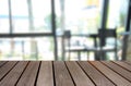 Blurred image wood table and abstract visitor`s chair in office.