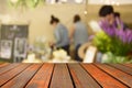 Blurred image wood table and food at night festival with bokeh b