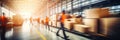 Blurred image of workers or warehouse employees in action, moving shipment boxes efficiently, showcasing the dynamics of Royalty Free Stock Photo