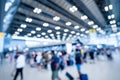 Blurred images of trade fairs in the big hall. image of people walking on a trade fair exhibition or expo where business people Royalty Free Stock Photo