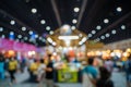 Blurred images of trade fairs in the big hall. image of people walking on a trade fair exhibition or expo where business people Royalty Free Stock Photo