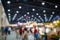 Blurred images of trade fairs in the big hall. image of people walking on a trade fair exhibition or expo where business people Royalty Free Stock Photo