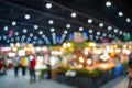 Blurred images of trade fairs in the big hall. image of people walking on a trade fair exhibition or expo where business people Royalty Free Stock Photo