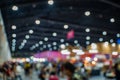 Blurred images of trade fairs in the big hall. image of people walking on a trade fair exhibition or expo where business people Royalty Free Stock Photo