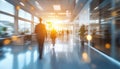 Blurred Interior Of A Modern Office Space With Business People Engaged In Work Tasks In An Abstract Royalty Free Stock Photo