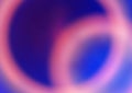 Blurred intersecting rings on blue ultramarine background Royalty Free Stock Photo