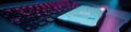 Blurred keyboard with smartphone displaying email inbox, log in, inbox Royalty Free Stock Photo