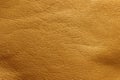 Blurred leather background, ocher color. Abstract texture background out of focus. Royalty Free Stock Photo