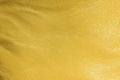 Blurred leather background, ocher color. Abstract texture background out of focus. Royalty Free Stock Photo