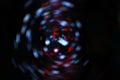 Blurred LED screen closeup. Glowing threads in a color spectrum on a black background Royalty Free Stock Photo