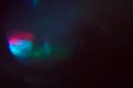 Blurred lens flare. Defocused colorful lights. Shiny glowing spots, abstract background and texture