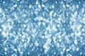 Blurred lifgt blue shiny glitter bokeh background, defocused soft blue silver shimmer backdrop design Royalty Free Stock Photo