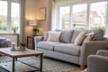Blurred light living room with grey sofas Royalty Free Stock Photo
