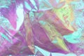 Blurred light rainbow crumpled holographic background