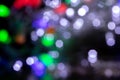 Blurred lights blue, green, red, gray background. Abstract bokeh with soft light. Shiny festive christmas texture Royalty Free Stock Photo