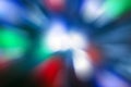 Blurred lights dark blue, red, green, white background. Abstract soft explosion effect. Centric motion pattern Royalty Free Stock Photo