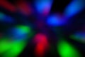 Blurred lights dark blue, red, pink, green background. Abstract soft explosion effect. Centric motion pattern Royalty Free Stock Photo